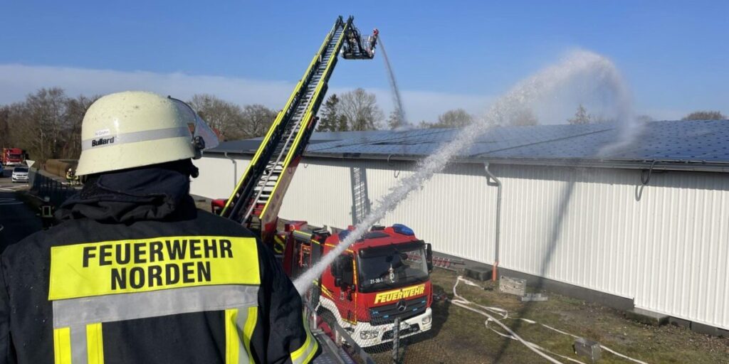 German Firefighters putting out solar panel fire
